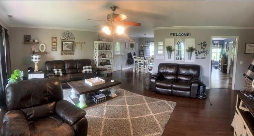 670 Armstrong Road Southeast Cleveland, TN 37323 - Photo 4 of 16 a living room with furniture and wooden floor