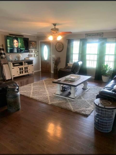 670 Armstrong Road Southeast Cleveland, TN 37323 - Photo 5 of 16 a room with wooden floor and flat screen tv