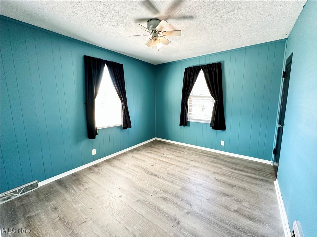 87 R 26th Street Wellsburg, WV 26070 - Photo 7 of 17 Bedroom featuring a ceiling fan