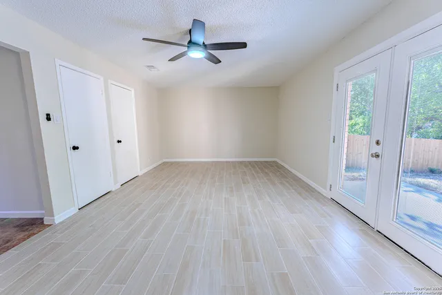 a view of kitchen and wooden floor