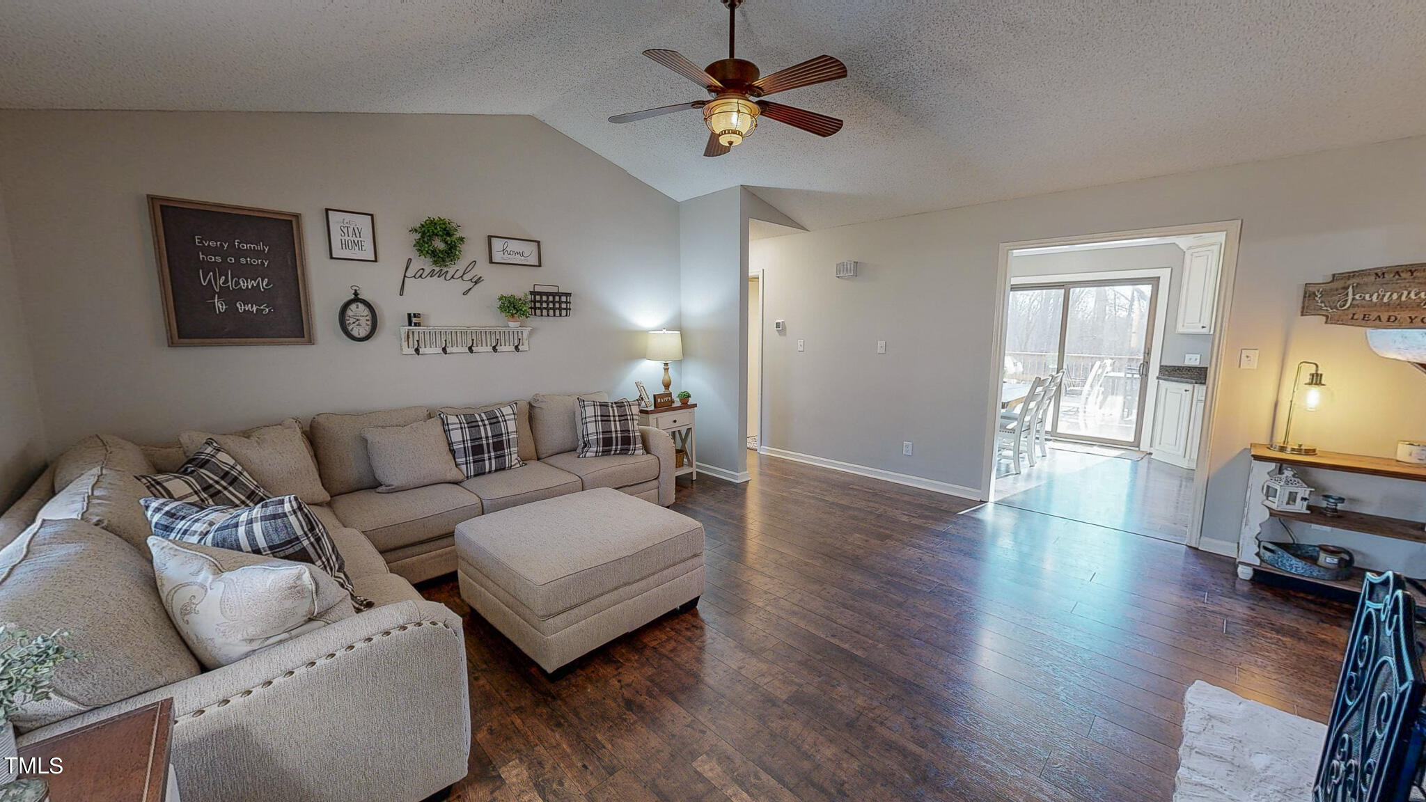 3618 Moriah Road Rougemont, NC 27572 - Photo 3 of 38 a living room with furniture a flat screen tv and a window