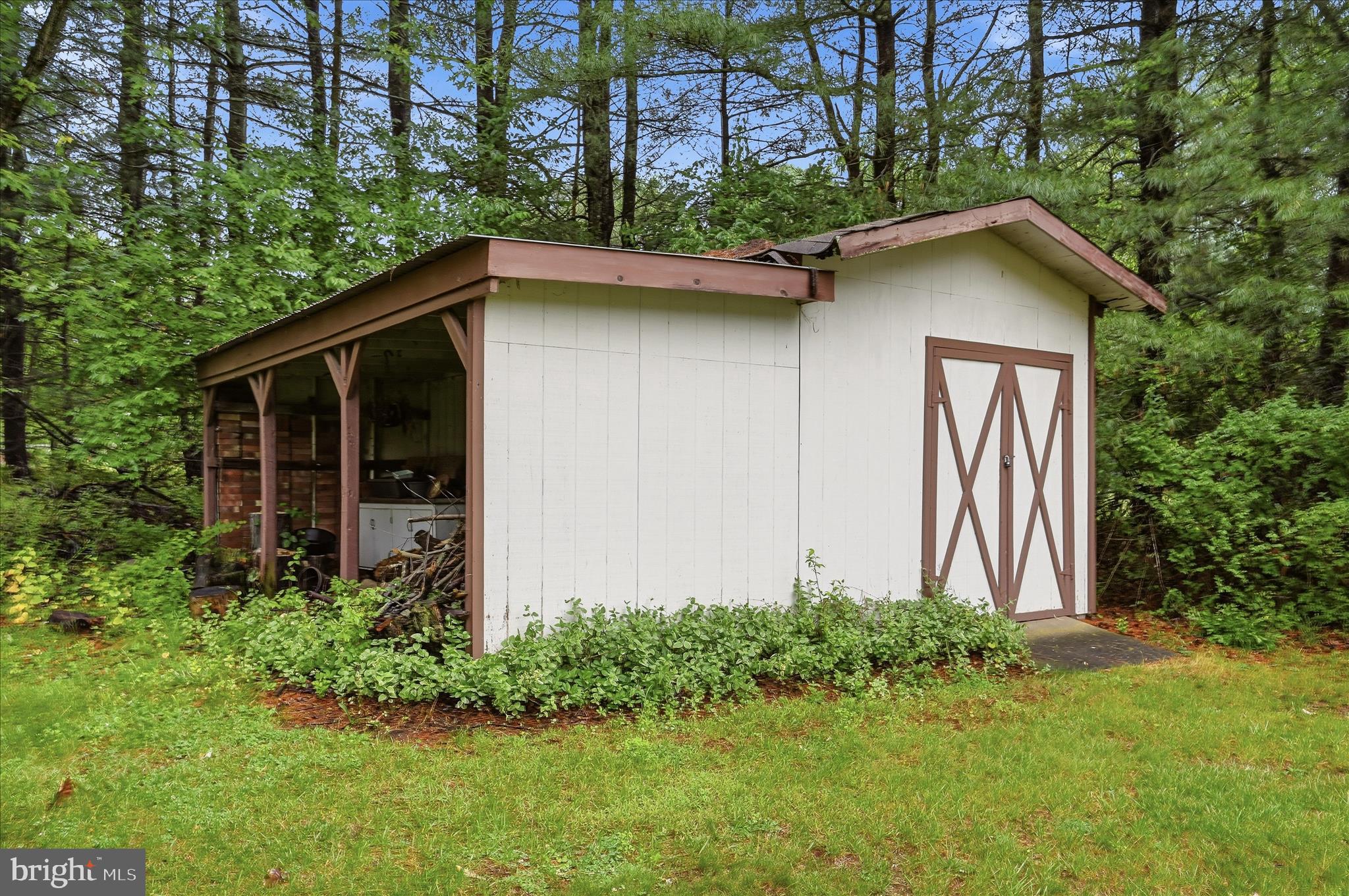 244 High Banks Road Stephenson, VA 22656 - Photo 34 of 45 a backyard of a house with lots of green space