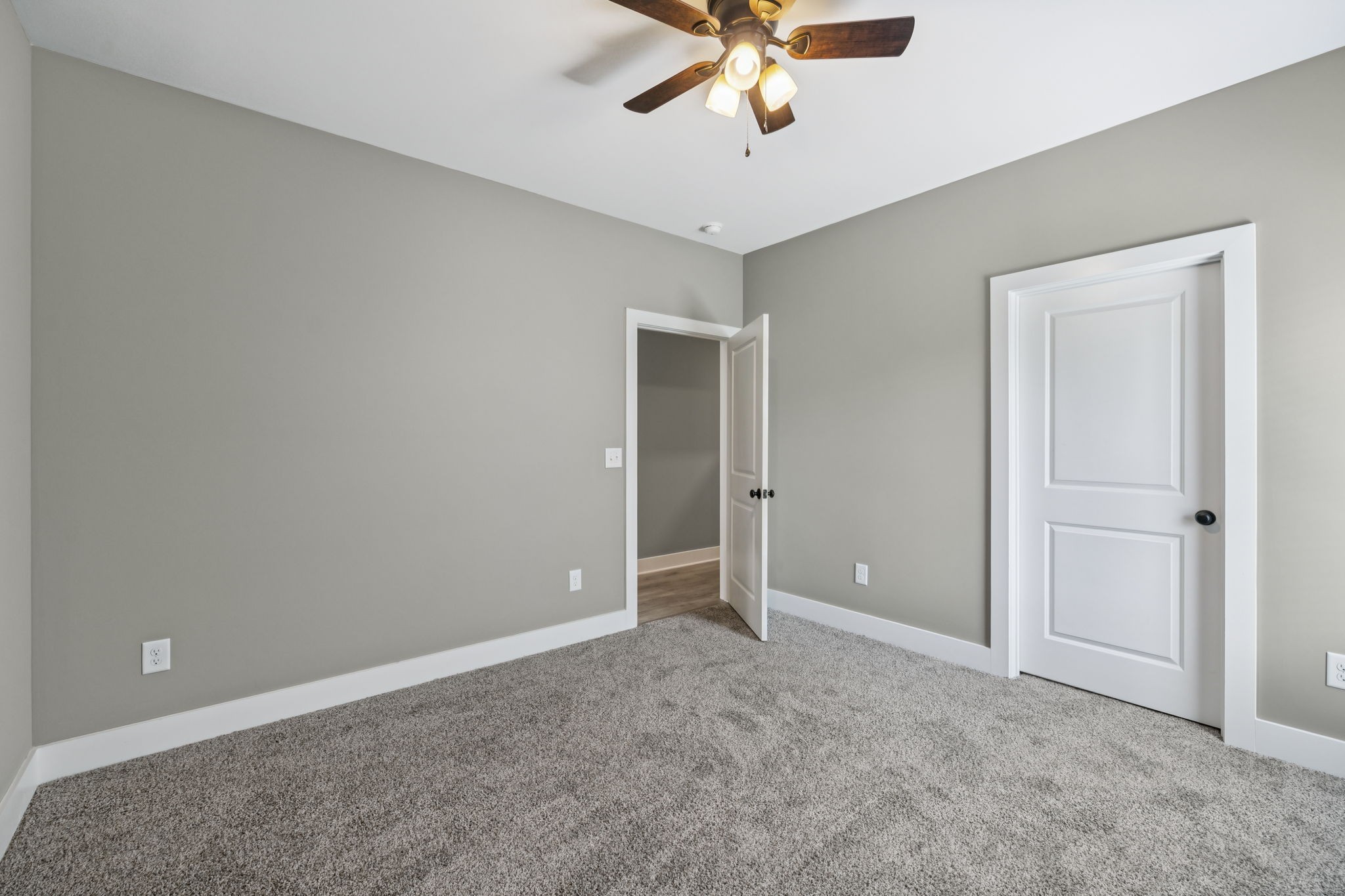1825 Shop Springs Road Watertown, TN 37184 - Photo 14 of 25 a view of an empty room with a chandelier fan