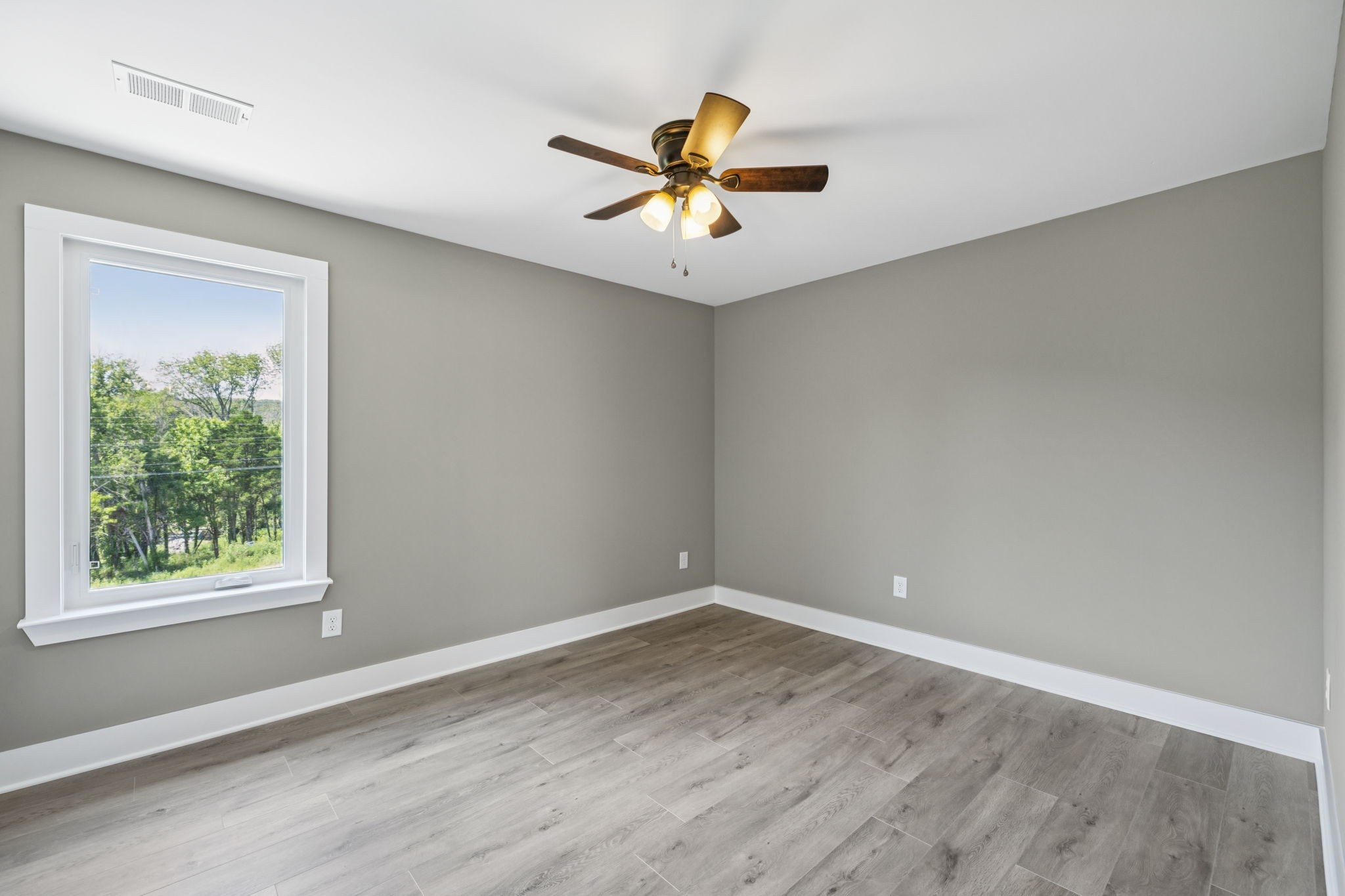 1825 Shop Springs Road Watertown, TN 37184 - Photo 21 of 25 wooden floor in a room with a window