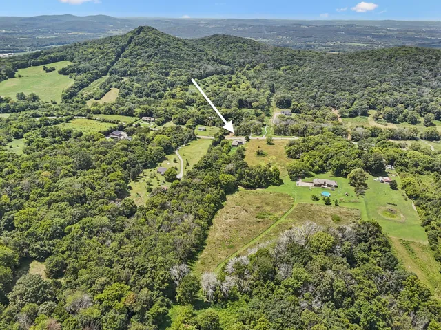 a view of a big yard with green space