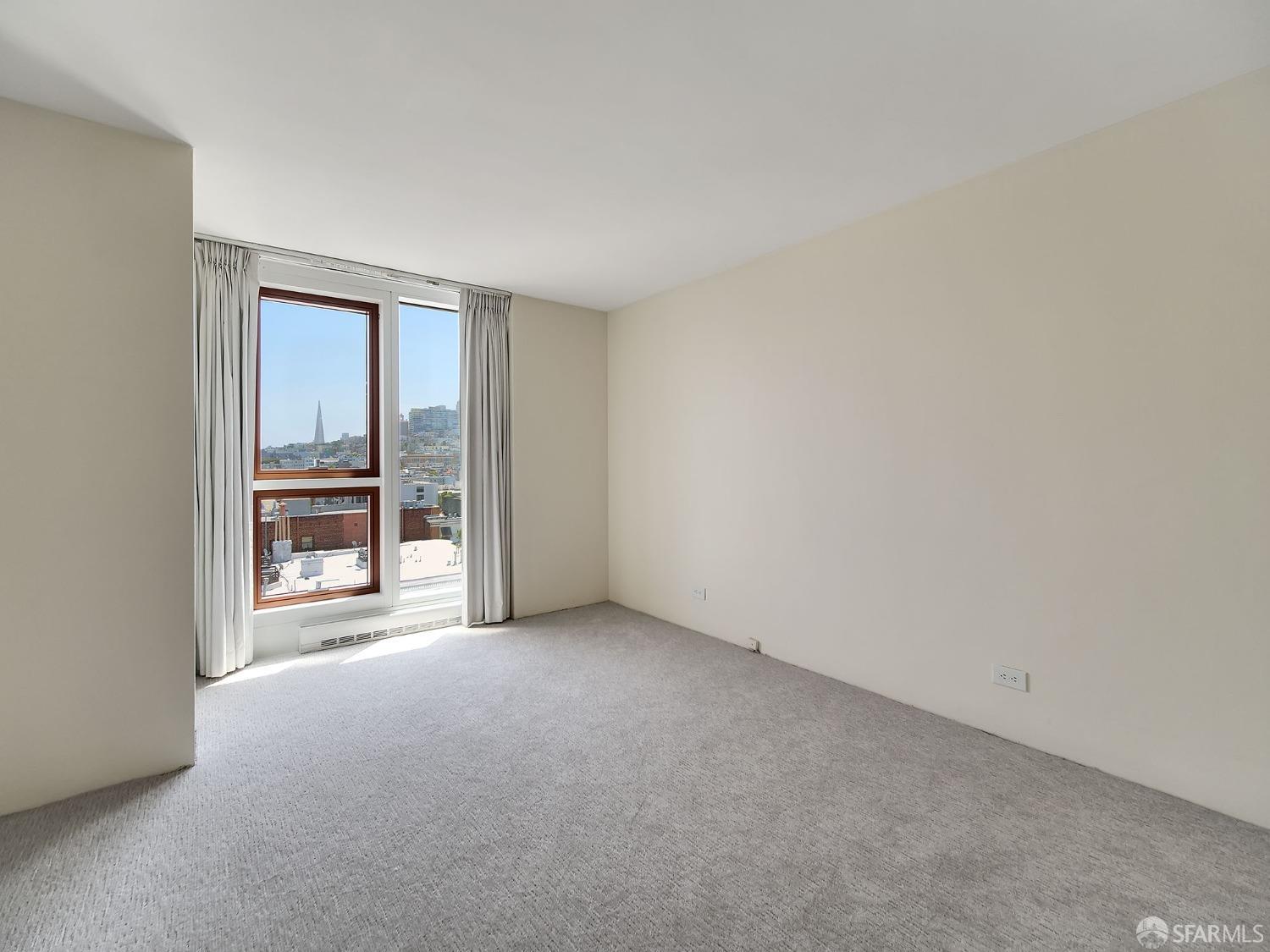 1800 Pacific Avenue, Unit 701 San Francisco, CA 94109 - Photo 18 of 36 a view of an empty room with a window