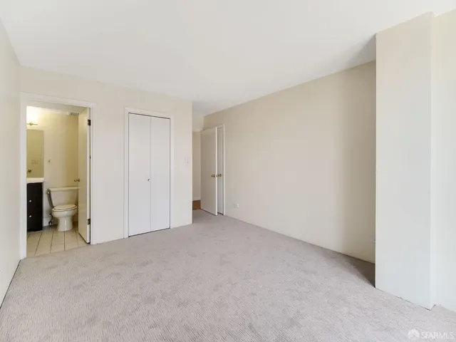 an empty room with closet