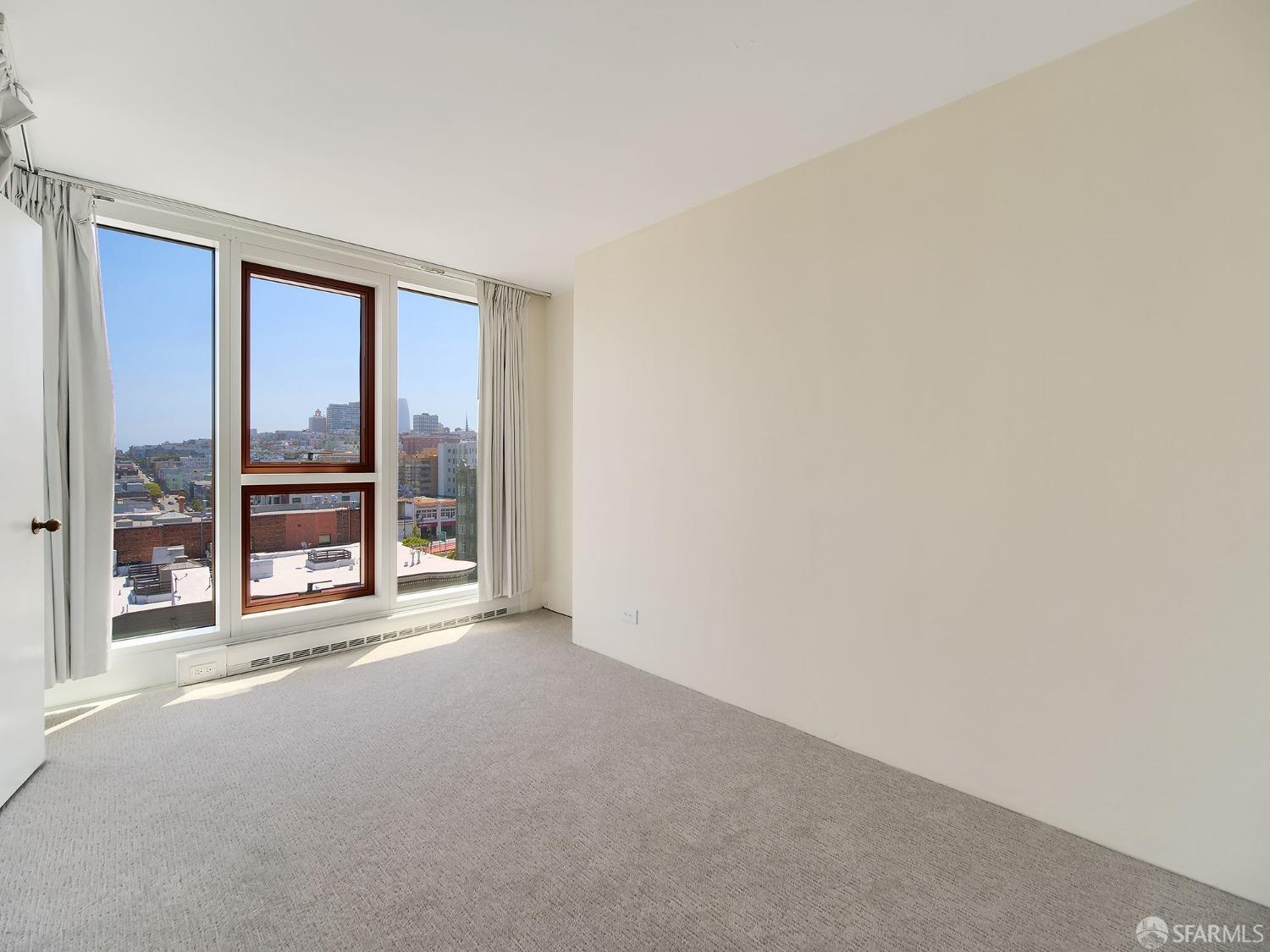 1800 Pacific Avenue, Unit 701 San Francisco, CA 94109 - Photo 25 of 36 a view of an empty room with a window