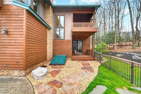 a view of a patio with a yard