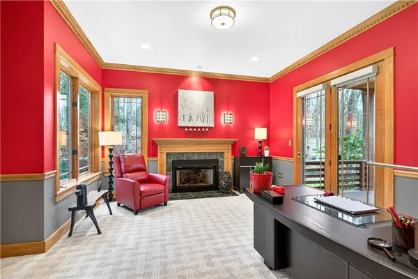 a living room with furniture flat screen tv and a fireplace