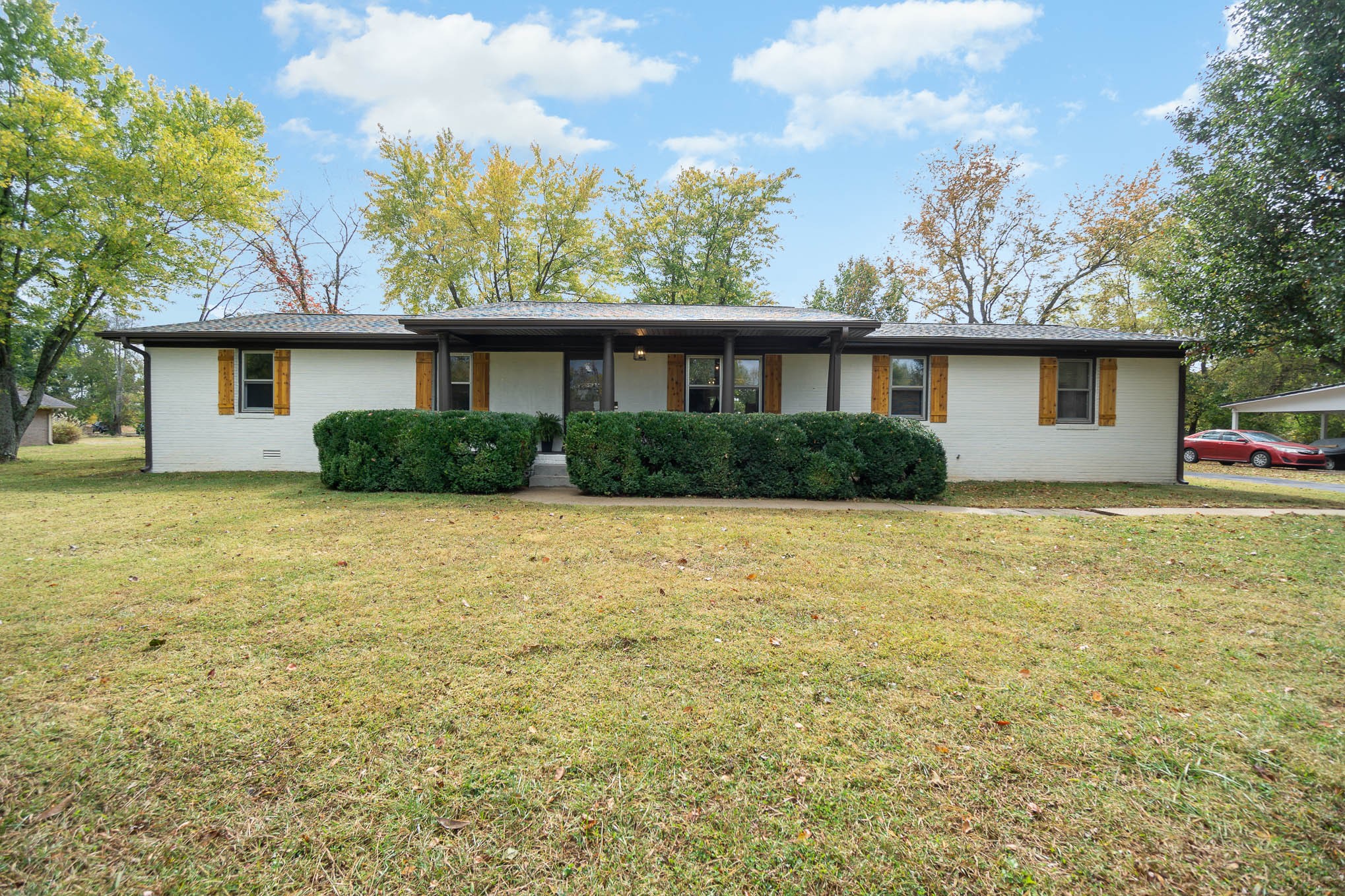 1261 Harrison Road Murfreesboro, TN 37128 - Photo 1 of 24 front view of house with a yard