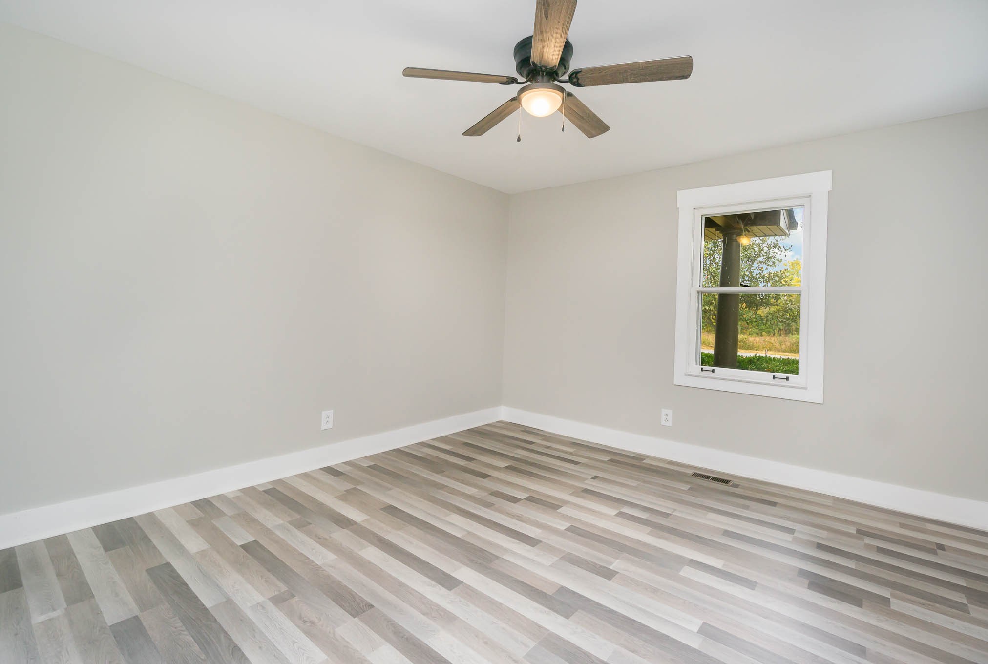 1261 Harrison Road Murfreesboro, TN 37128 - Photo 13 of 24 a view of room with window and ceiling fan