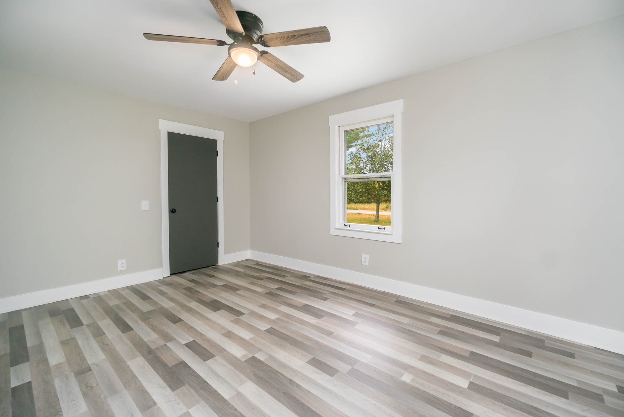 1261 Harrison Road Murfreesboro, TN 37128 - Photo 15 of 24 a view of empty room with window and ceiling fan