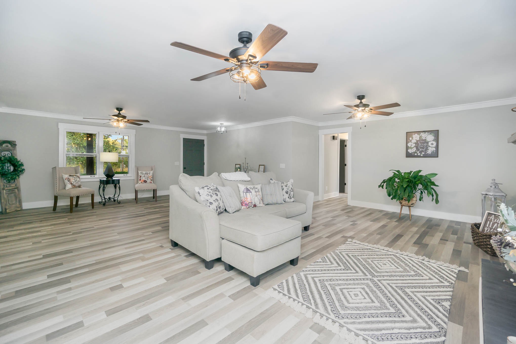 1261 Harrison Road Murfreesboro, TN 37128 - Photo 6 of 24 a living room with furniture and a chandelier
