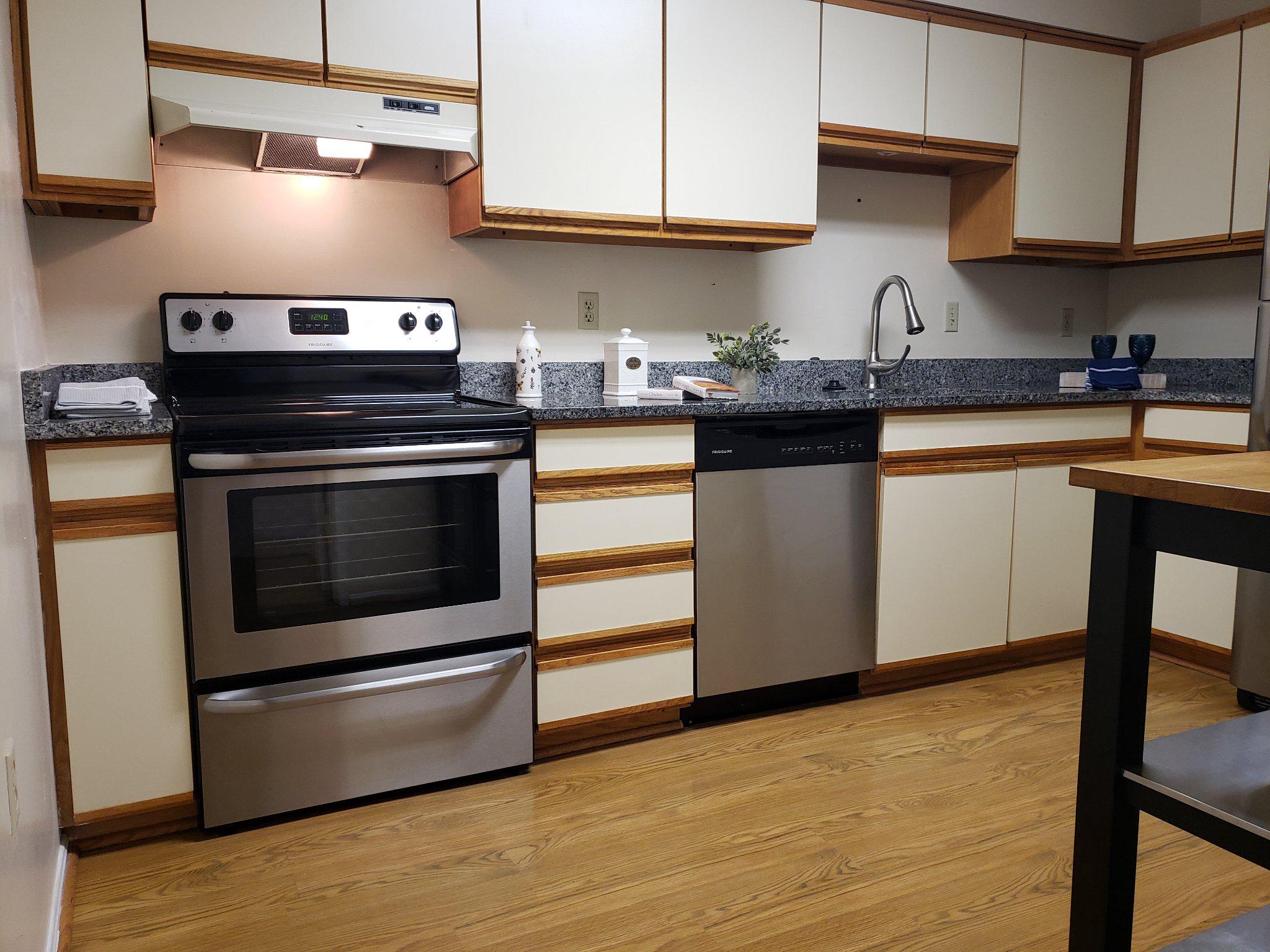 15100 Interlachen Drive, Unit 4520 Silver Spring, MD 20906 - Photo 3 of 39 Tablespace Kitchen with LVP Flooring