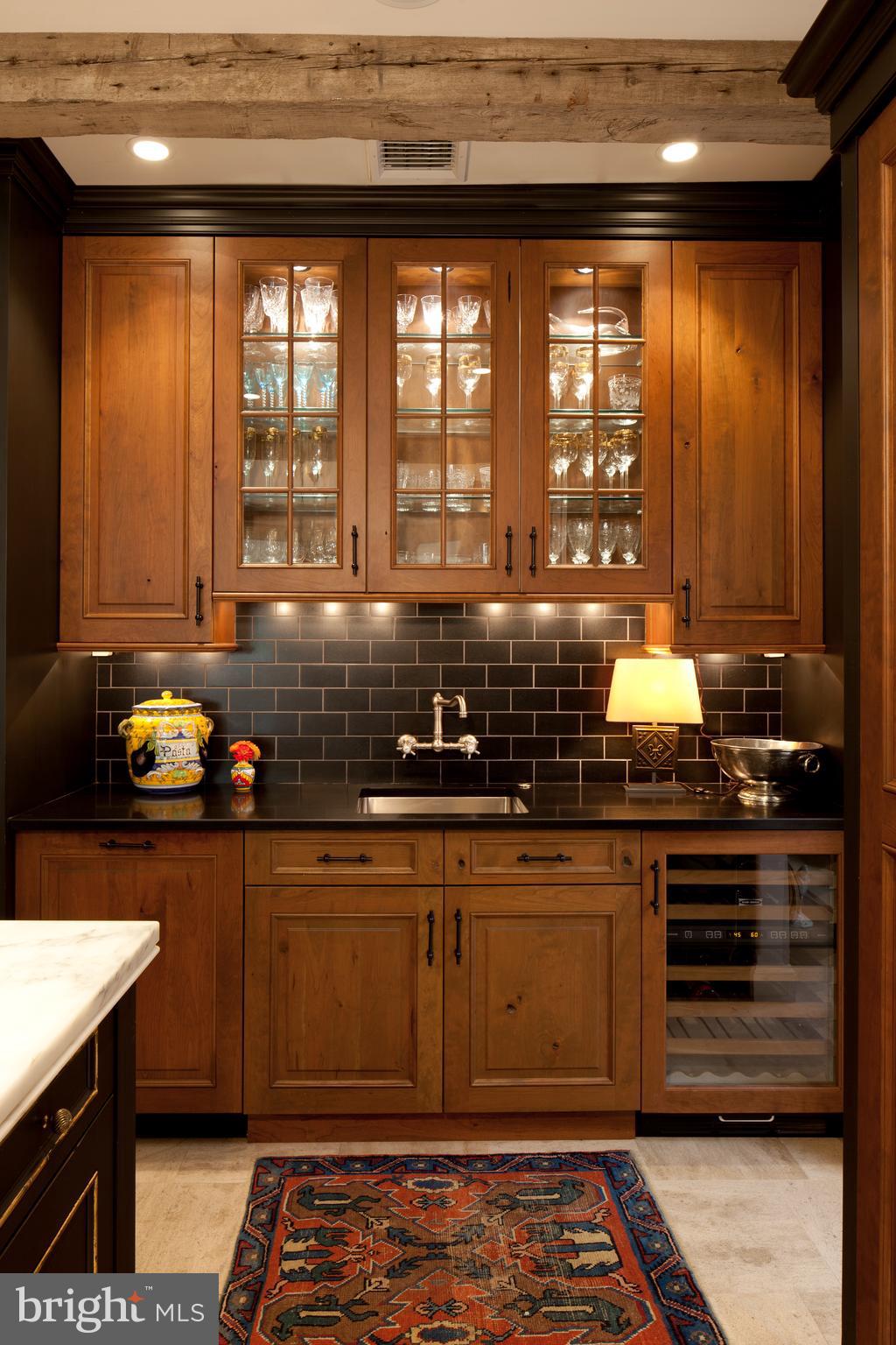 510 Hillbrook Road Bryn Mawr, PA 19010 - Photo 12 of 28 a kitchen with stainless steel appliances granite countertop a stove a sink and a microwave