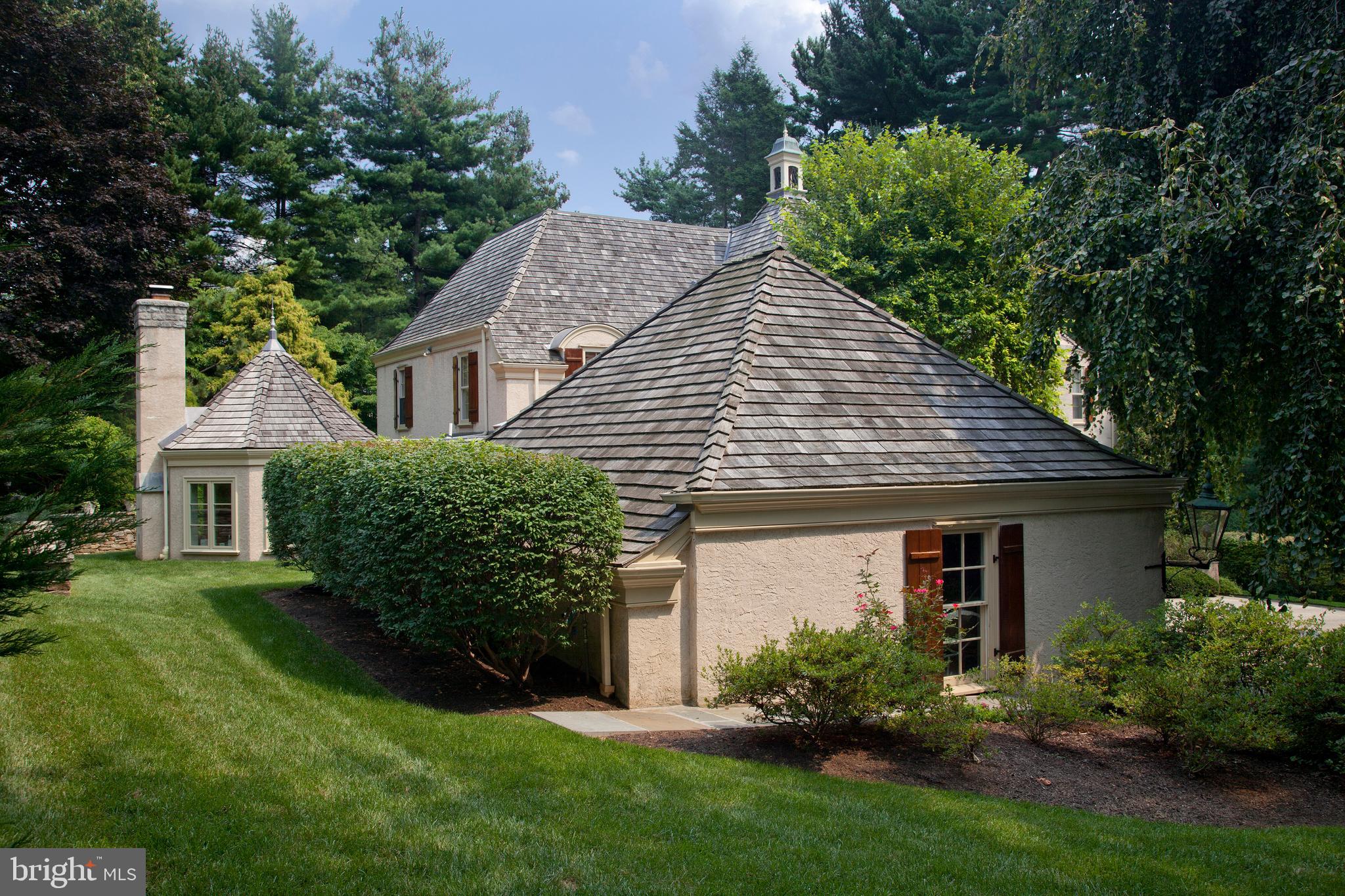 510 Hillbrook Road Bryn Mawr, PA 19010 - Photo 25 of 28 a front view of a house with a garden