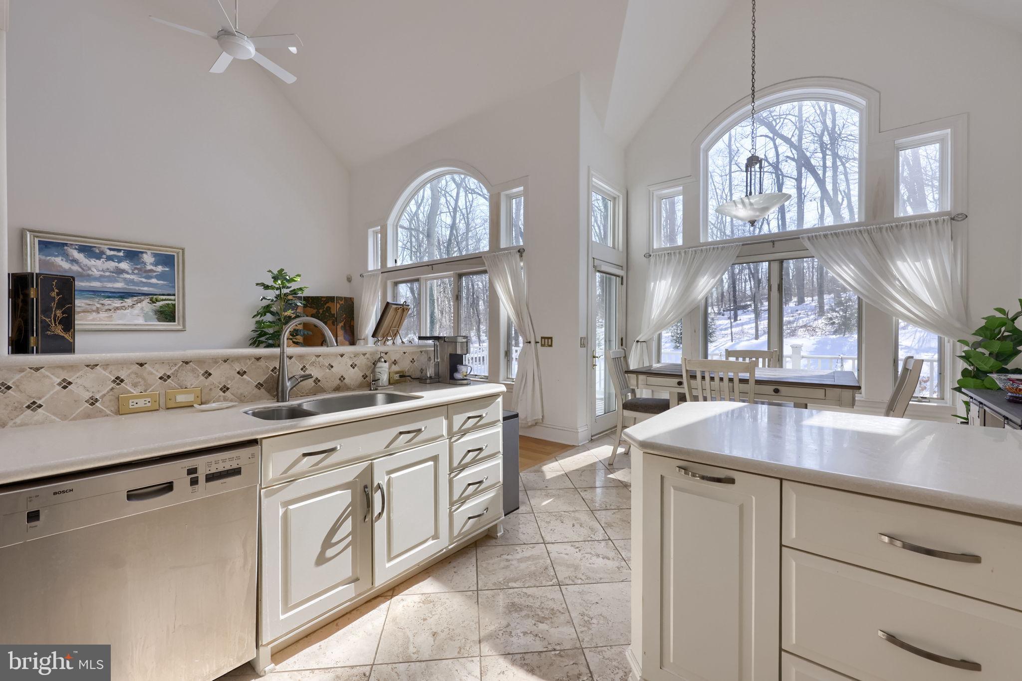 2492 Shaub Road Lancaster, PA 17601 - Photo 102 of 130 a kitchen with stainless steel appliances granite countertop a sink and a wooden floors