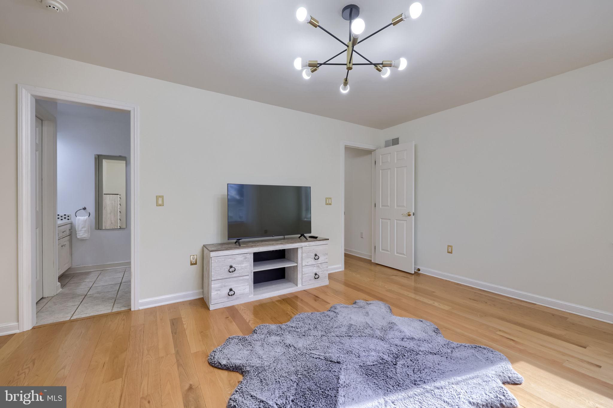 2492 Shaub Road Lancaster, PA 17601 - Photo 25 of 130 a view of a livingroom with furniture and a flat screen tv