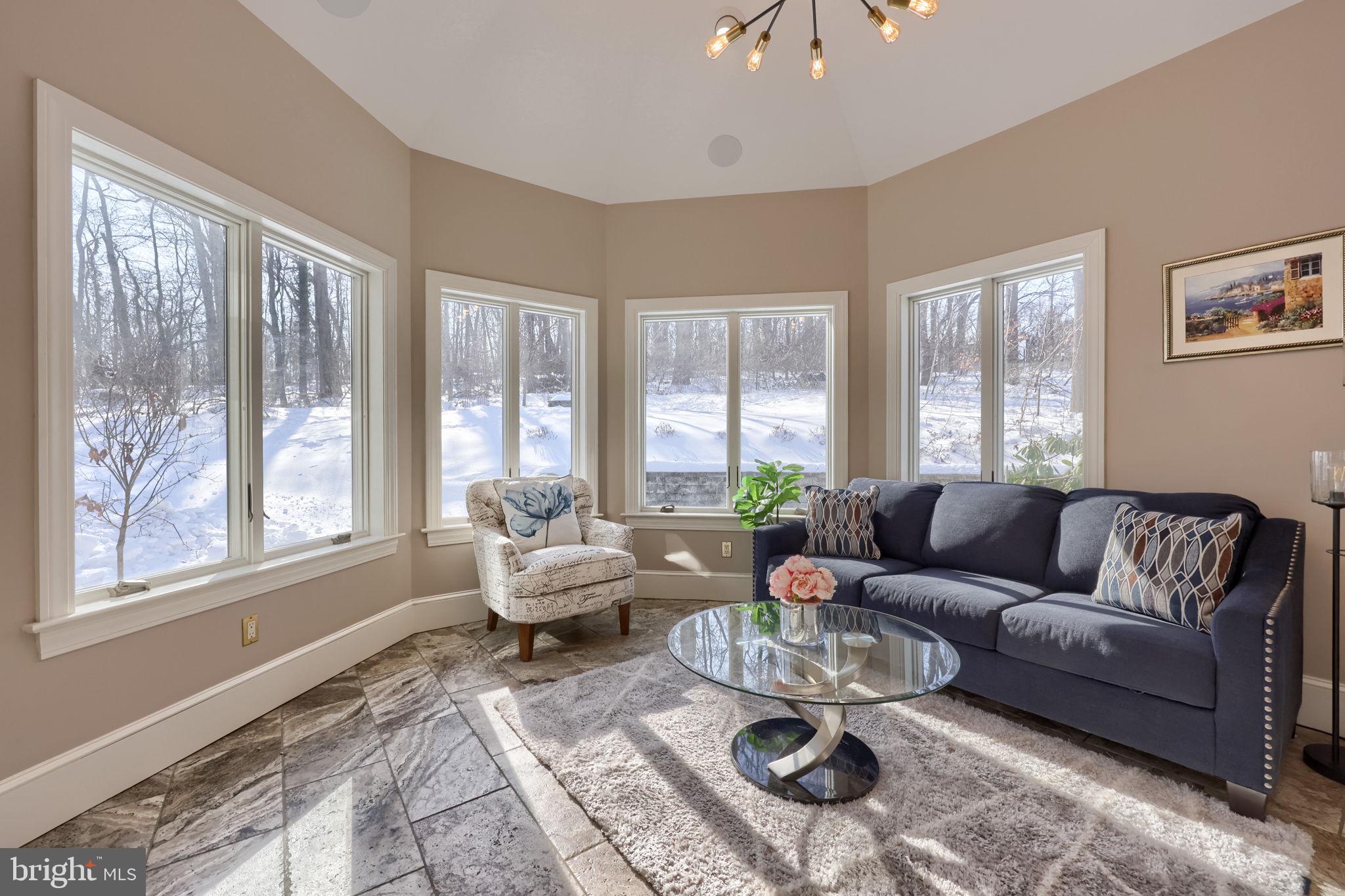 2492 Shaub Road Lancaster, PA 17601 - Photo 79 of 130 a living room with furniture large windows and wooden floor