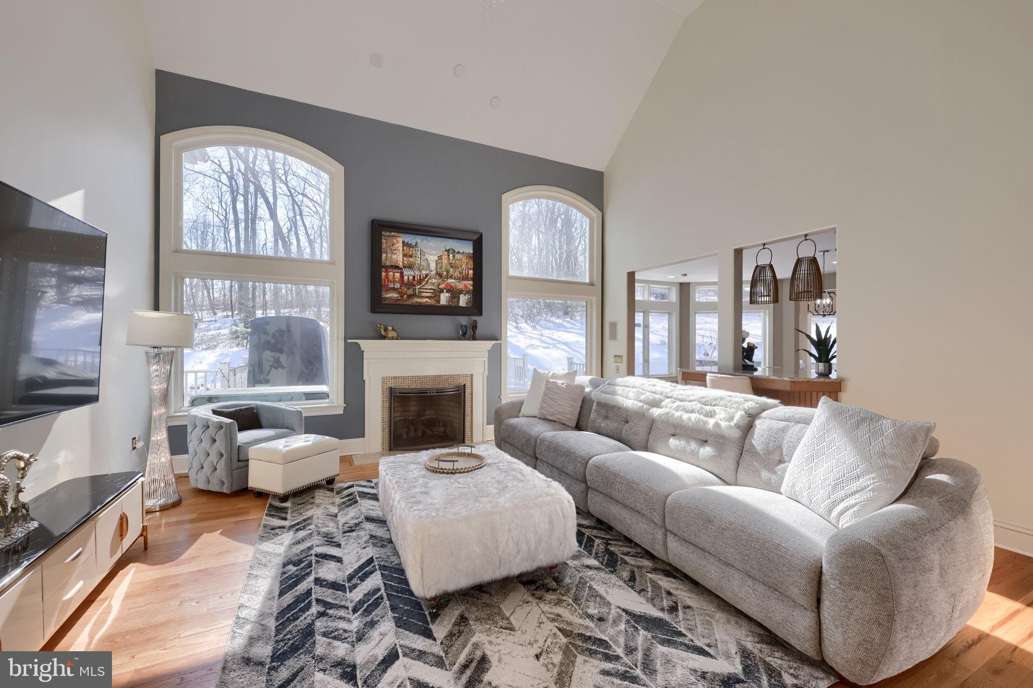 2492 Shaub Road Lancaster, PA 17601 - Photo 97 of 130 a living room with furniture fireplace and a flat screen tv