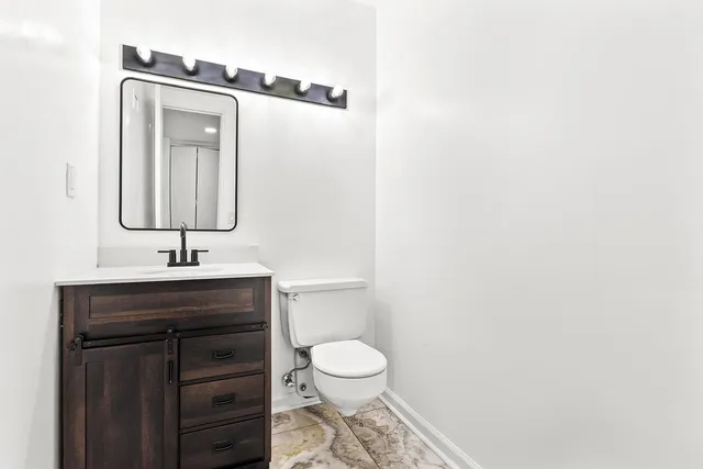 a view of a car parked in garage