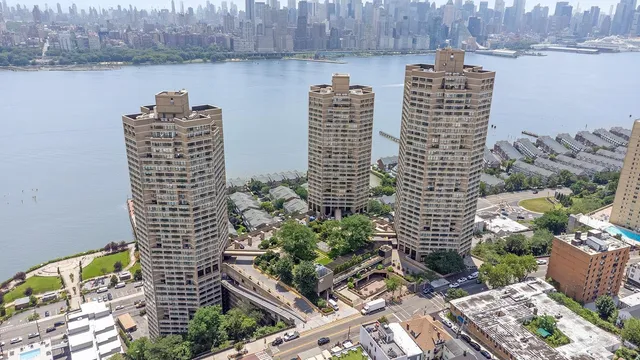 a view of a city with tall buildings