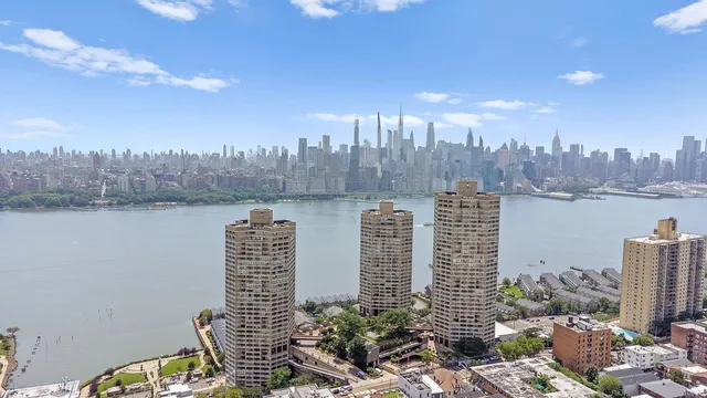 a view of a city with tall buildings