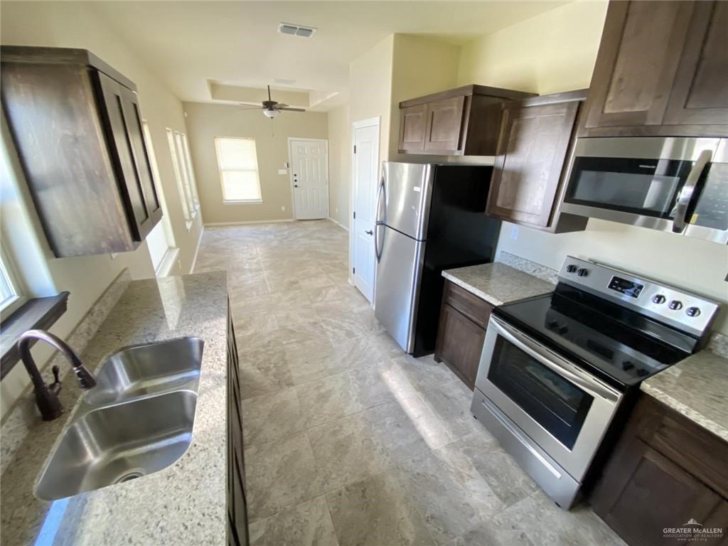 5904 Nightingale Avenue, Unit 2 Mission, TX 78573 - Photo 5 of 8 a view of a kitchen with a sink