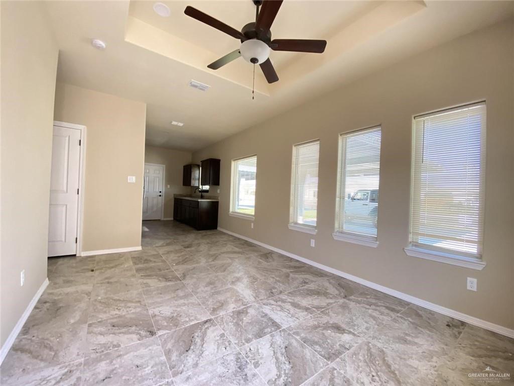 5904 Nightingale Avenue, Unit 2 Mission, TX 78573 - Photo 6 of 8 a view of an empty room with a window