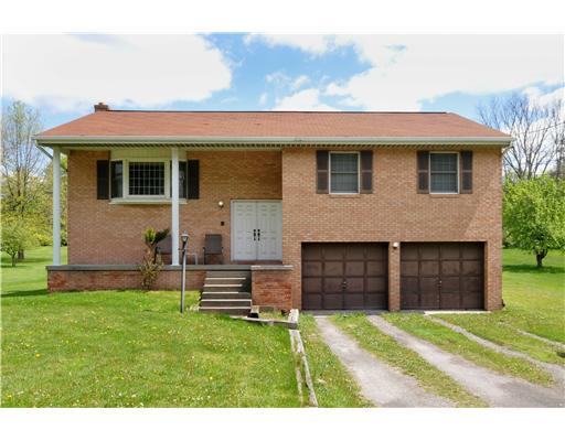 1225 Spring Run Road Extension Coraopolis, PA 15108 - Photo 1 of 13 Exterior Front. Brick front split entry on approx. 1/2 acre lot..