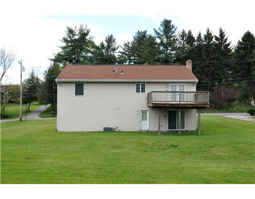 1225 Spring Run Road Extension Coraopolis, PA 15108 - Photo 12 of 13 Exterior Back. Rear view of house with level yard