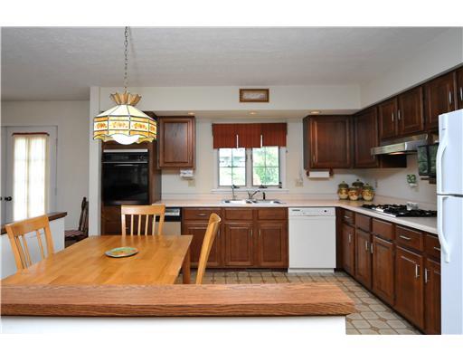 1225 Spring Run Road Extension Coraopolis, PA 15108 - Photo 5 of 13 Kitchen. Kitchen has gas stove cook top and new disposal and trash compactor