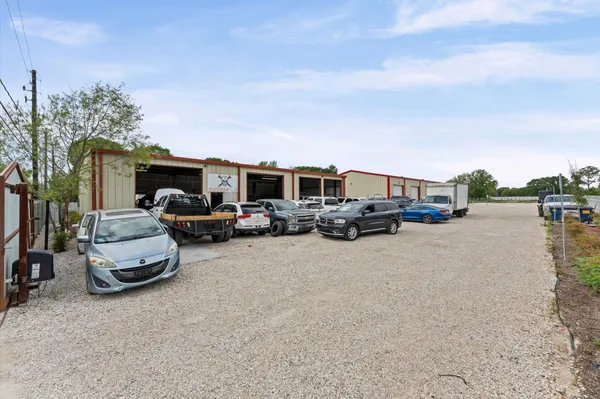 a view of cars parked in a parking lot