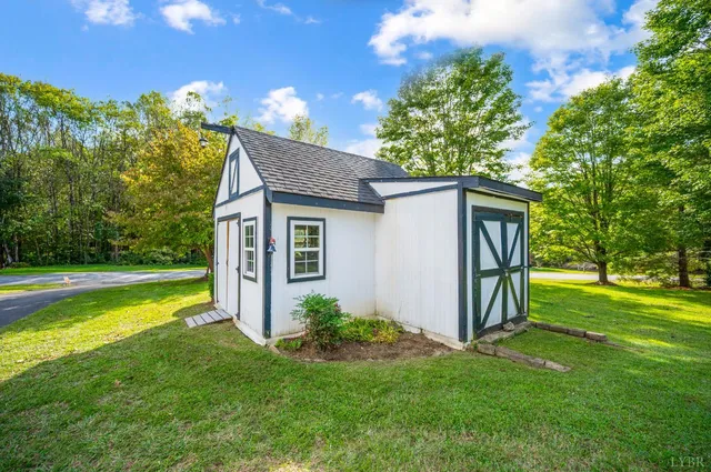 a view of swimming pool from a yard
