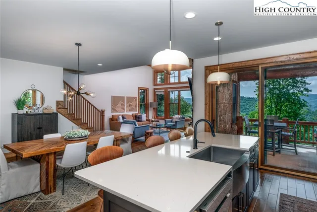 a view of a balcony with furniture