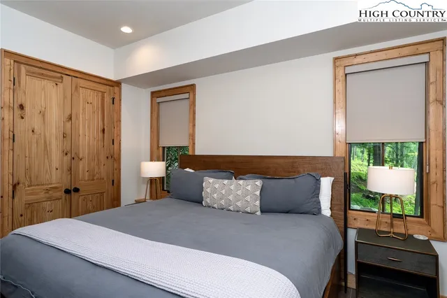 a bathroom with a shower sink and mirror