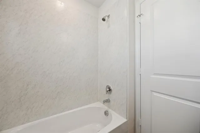 a bathroom with a bathtub