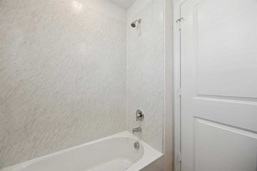 323 Clematis Street Princeton, TX 75407 - Photo 29 of 34 Full bathroom featuring shower combination
