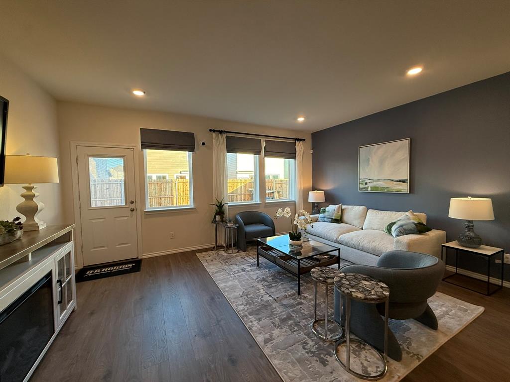 323 Clematis Street Princeton, TX 75407 - Photo 5 of 34 Living area with dark wood-style flooring and recessed lighting