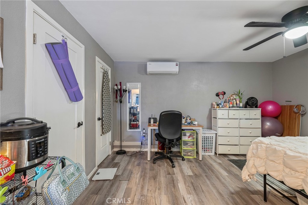 11309 Telechron Avenue, Unit B Whittier, CA 90605 - Photo 11 of 17 a bedroom with furniture and a window