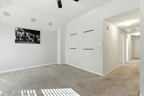 a view of a hallway with staircase