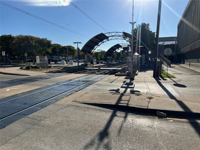 a view of a street with cars
