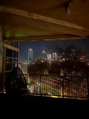 a view of a building with sitting area