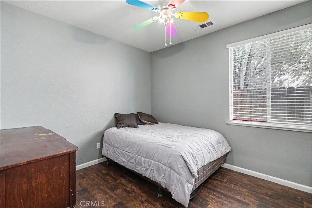 3632 Swan Court Merced, CA 95340 - Photo 33 of 50 a bedroom with a bed and window