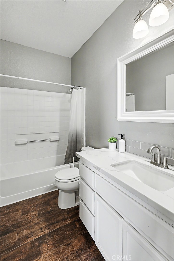 3632 Swan Court Merced, CA 95340 - Photo 37 of 50 a bathroom with a sink a toilet and shower