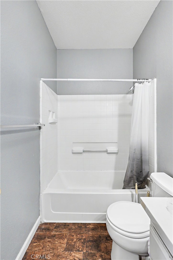 3632 Swan Court Merced, CA 95340 - Photo 38 of 50 a bathroom with a toilet and a shower