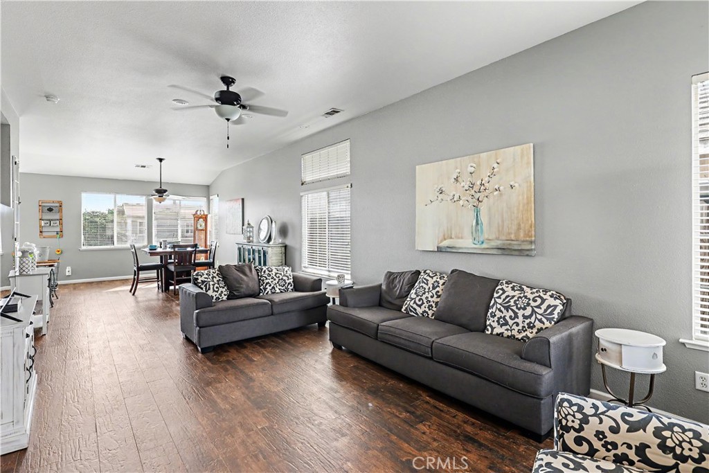 3632 Swan Court Merced, CA 95340 - Photo 8 of 50 a living room with furniture and a wooden floor