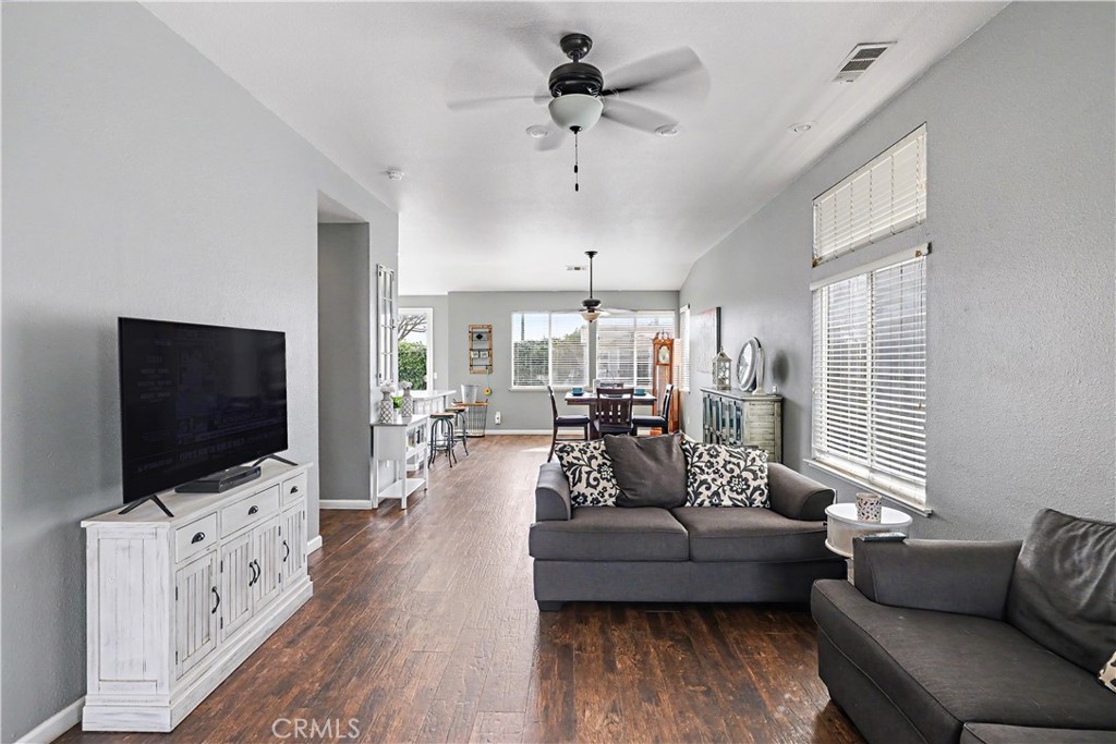 3632 Swan Court Merced, CA 95340 - Photo 9 of 50 a living room with furniture and a flat screen tv