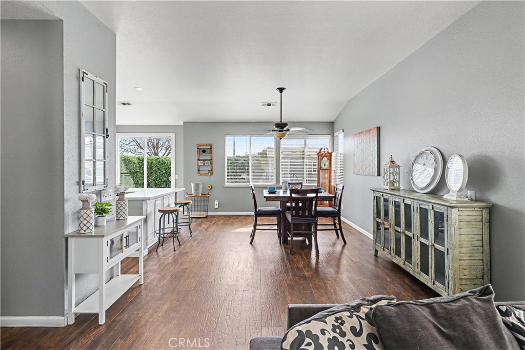 3632 Swan Court Merced, CA 95340 - Photo 10 of 50 an open kitchen with dining table and chairs